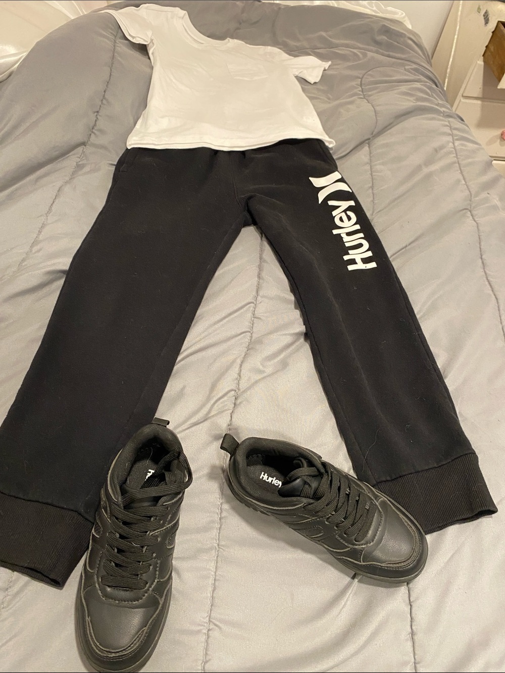 This is a 3 SETHurley Black Jogger Pants 10/12. Hurley sneakers size 1 white tee